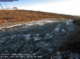 Overlooking a small creek within a snowy area